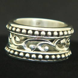 R263 carved koru band